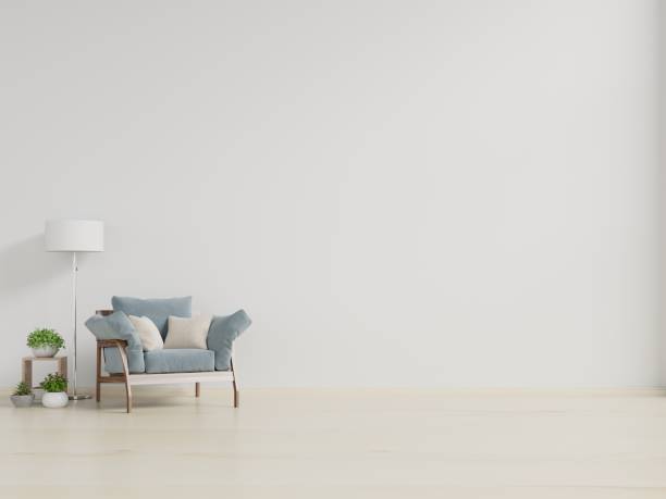 istock Empty wall in pastel modern interior with armchair on white wall. 1179274357