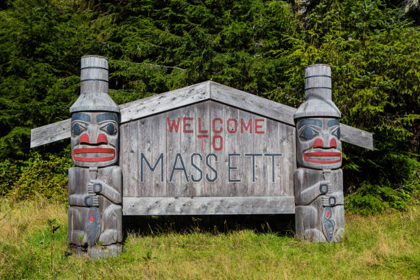 Welcome to Masset Masset, Canada - September 27, 2019. Masset is a small village on the northern end of Haida Gwaii,formerly the Queen Charlotte Islands. The Haida, who live in the area, are well known for their art - featured on this village's welcome sign. haida gwaii totem poles stock pictures, royalty-free photos & images