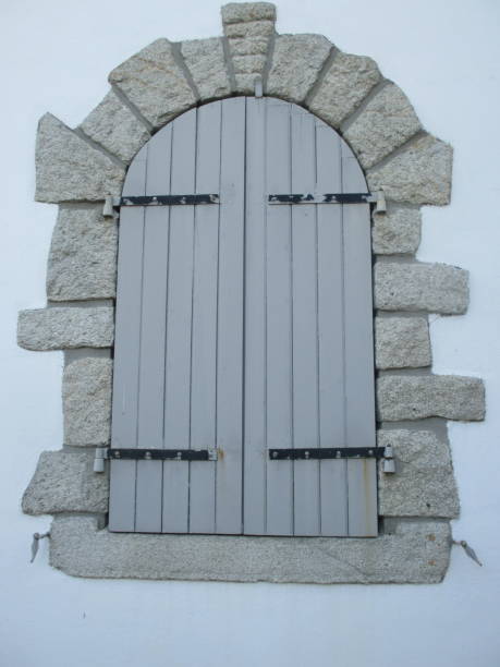 istock Window with wooden shutters  Window closed 1179284041