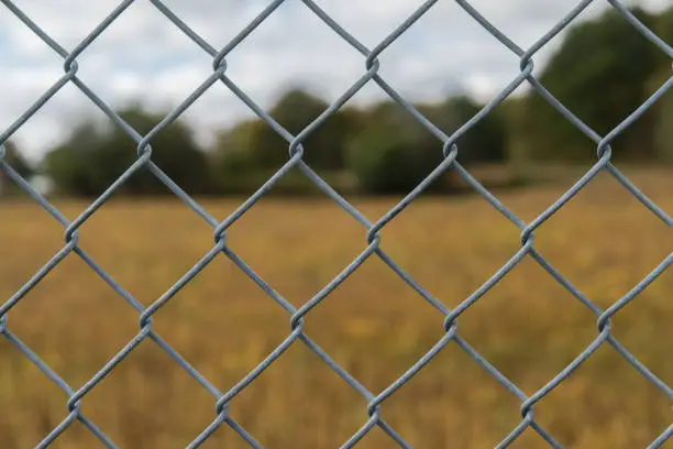 Photo of Chain-link fencing with blurred background