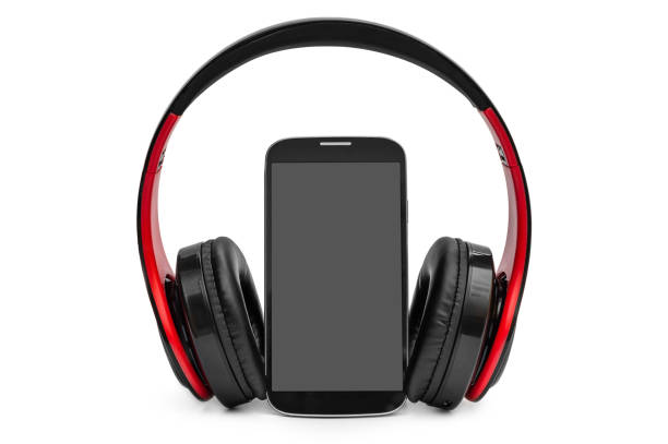 istock Smartphone with headphones on white. 1179291590