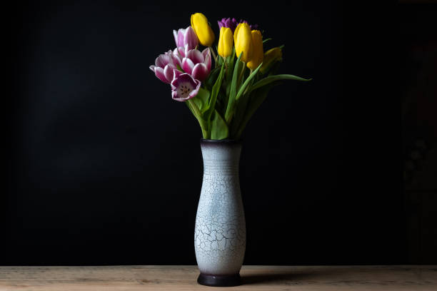 istock one vase with a bouquet of tulips 1179296466