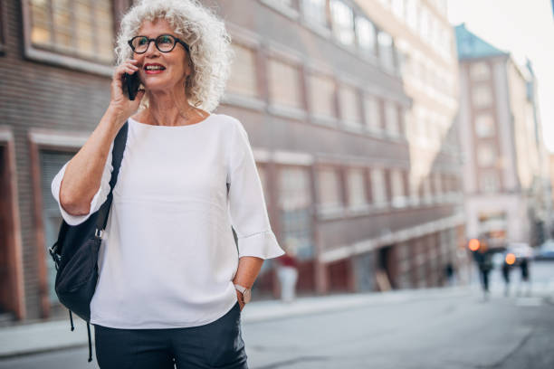 istock Senior woman using phone 1179302208