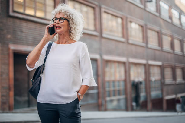 istock Senior woman using phone 1179302230