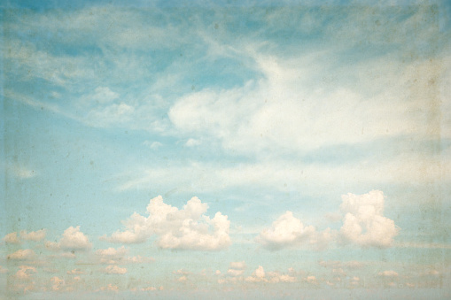 Vintage sky with cumulus humilis clouds.
