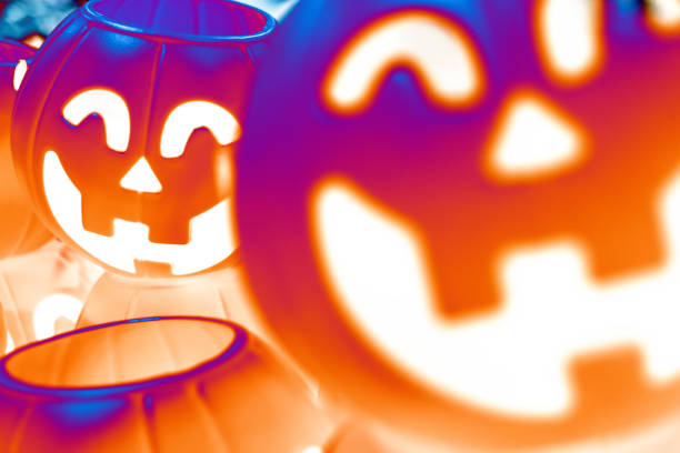 a blurry Jack o'lantern or halloween pumpkins with negative color effect