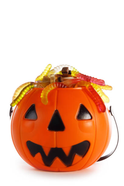 istock Halloween candies in Jack-O-Lantern bag 1179307491