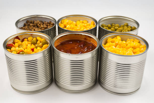 istock Canned food on white background. Green pea, beans, corn, lentils. 1179308383