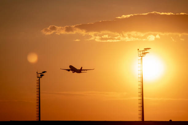 istock Airplane Taking Off From Airport At Sunset 1179308656