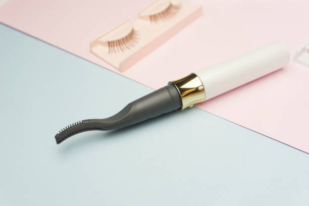 istock tweezer and eye lash extension 1179310252