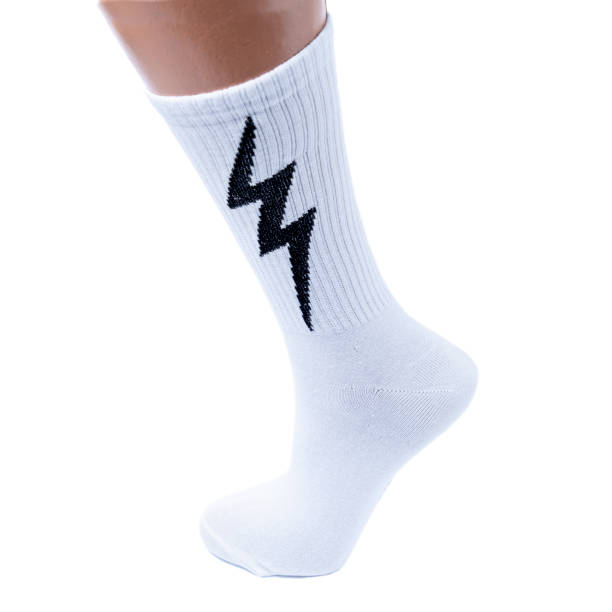 istock white and black  socks with lightning on it in the white isolated background 1179311587