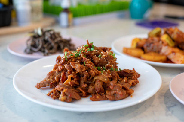 Fried pork(Bulgogi) with spicy korean sauce on a plate