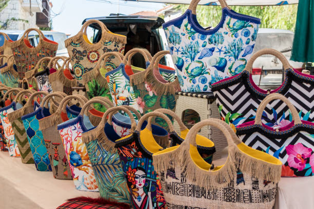 Colourful handbags for sale on a market stall on Alacati Saturday market, Izmir, Turkey
