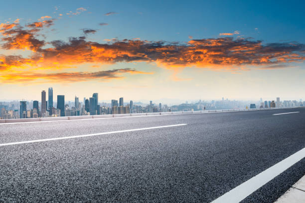 istock Sunset cityscape and empty asphalt road in Chongqing 1179318172