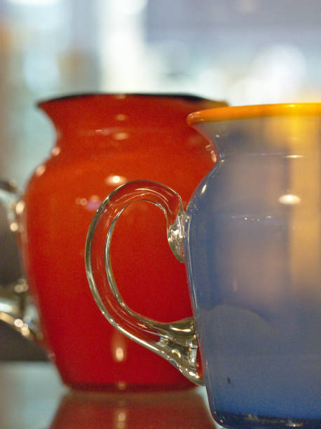 istock Glass Mugs in red and blue 1179318253