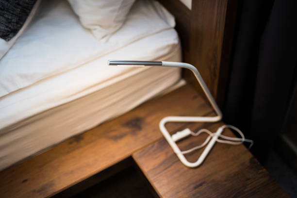 istock Modern white lamp next to the bed 1179318916