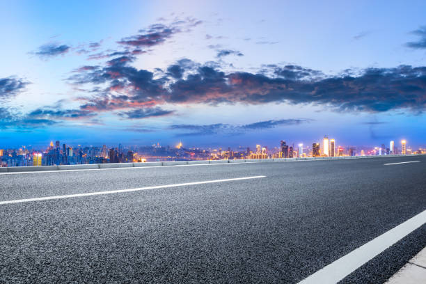 istock Sunset cityscape and empty asphalt road in Chongqing 1179318977