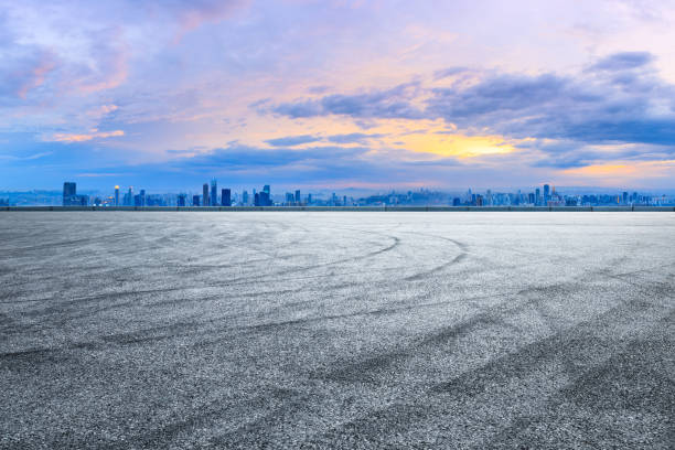 istock Sunset cityscape and empty asphalt road in Chongqing 1179318987