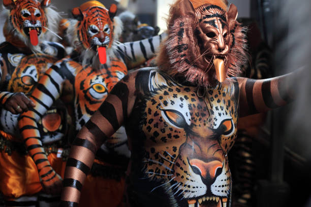 Thrissur, India - September 10,2014:Body painted people getting ready for 'tiger dance' performance in Thrissur, Kerala,India. Tiger dance is a traditional item performed during the Onam festival.