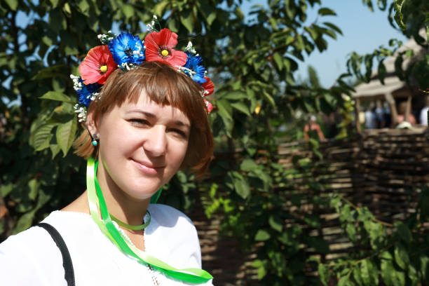 istock Woman with floral wreath on head 1179319600