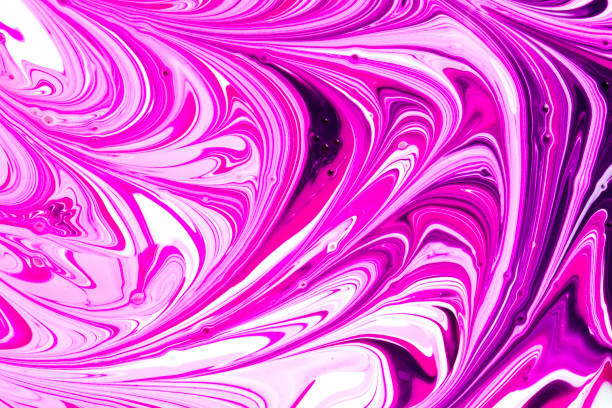 istock Pink, purple and white paint swirls 1179319962