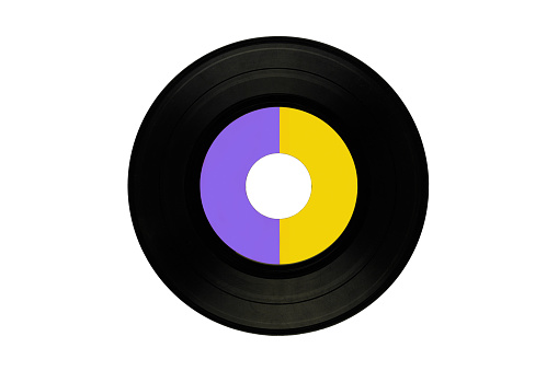 Vinyl record over white background. Horizontal composition with copy space. Vintage music concept.