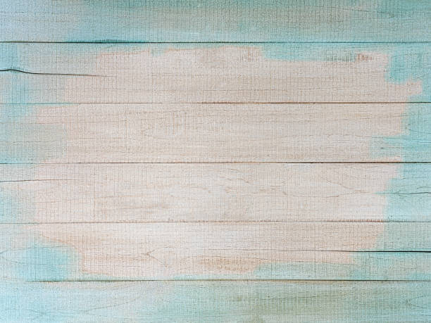 Distressed, worn, weathered, old, blue and white, wooden panel abstract background.