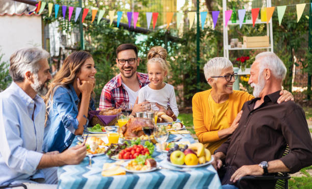 istock Happy family celebrating Thanksgiving day 1179326055