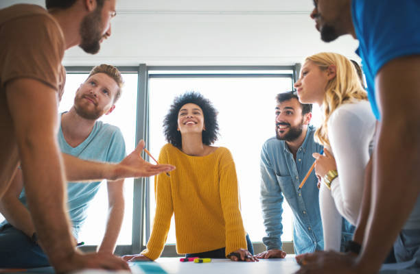 istock Group of young designers at a studio. 1179332081
