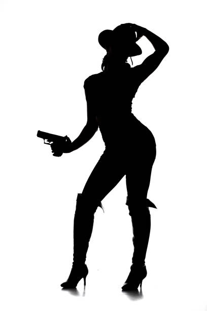 istock Sexy Female Gangster Silhouette 1179333069