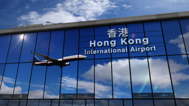 istock Airplane landing at Hong Kong mirrored in terminal 1179334639