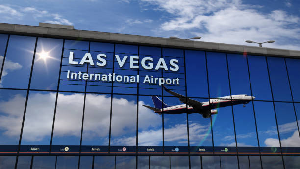 Airplane landing at Las Vegas Nevada mirrored in terminal