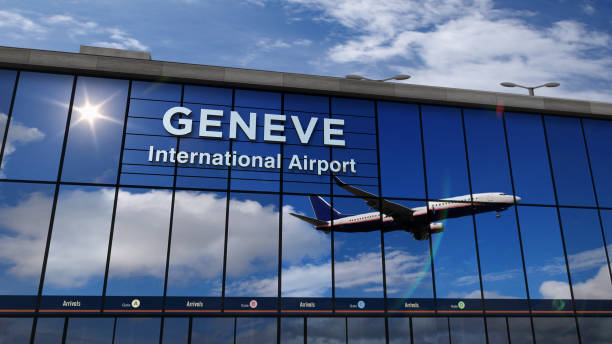 istock Airplane landing at Geneve mirrored in terminal 1179334736