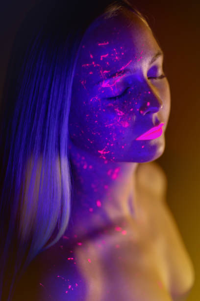 istock Woman with long hair in neon light. 1179340297