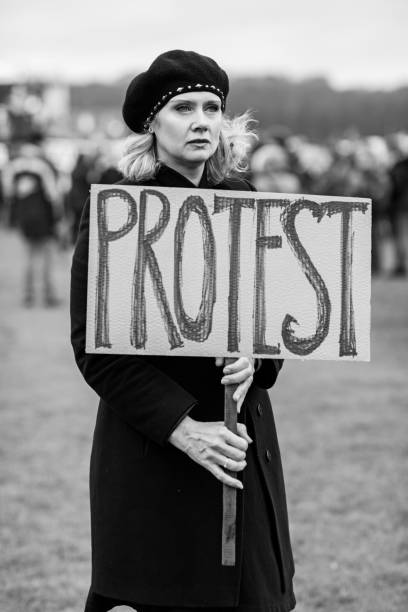 istock Beautiful blonde woman protesting 1179343510