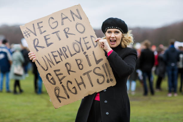 istock Beautiful blonde woman protesting 1179344050