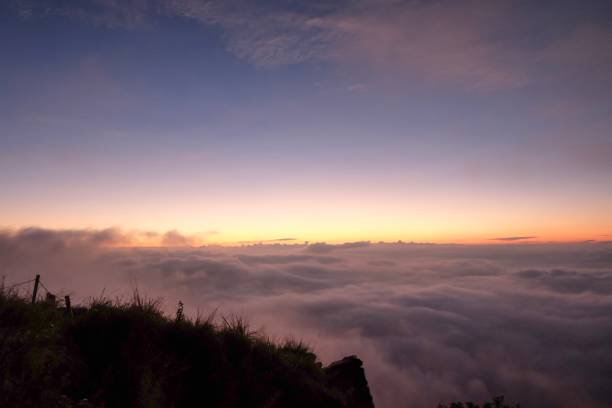 istock Sunrise above the cloud and fog. 1179344160