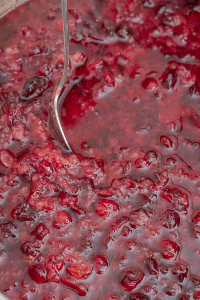 istock Crushed Red cranberry filled with alcohol before cooking tinctures 1179344782