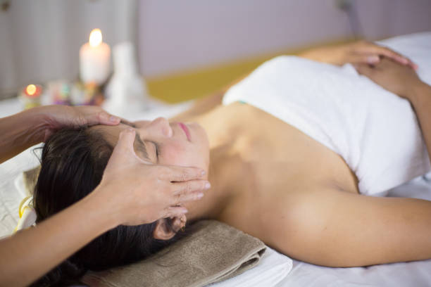 istock An Asian woman is massaging a herbal spa with a relaxing, happy feeling. 1179344982