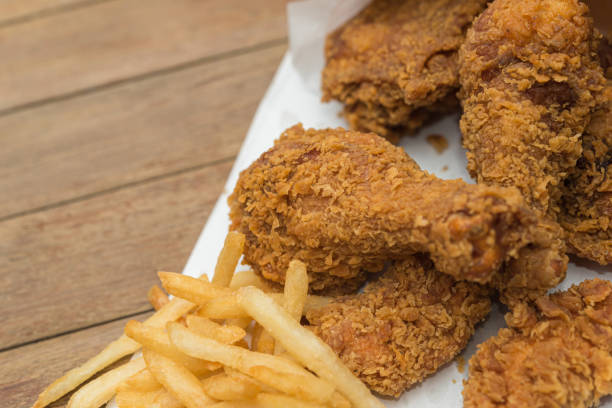 istock Fried chicken and French fries or chips (potato) 1179346444