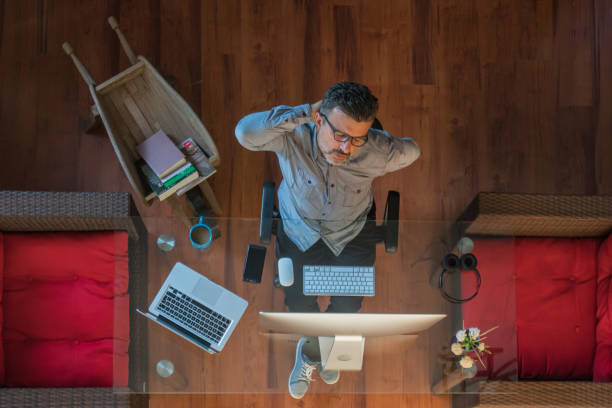 istock Businessman sitting in office has a backache 1179347571