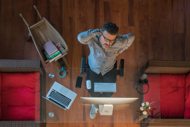 istock Businessman sitting in office has a backache 1179347658