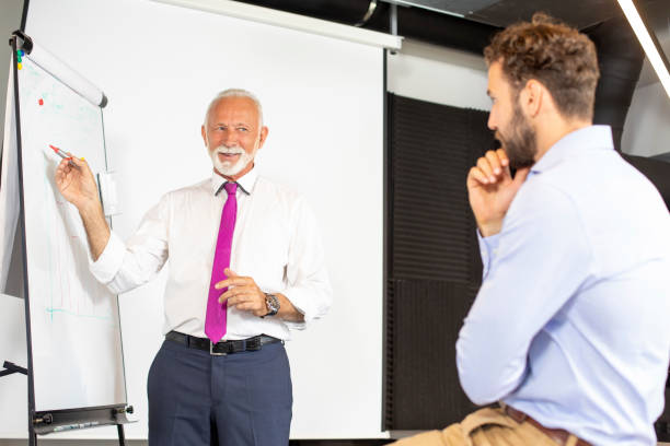 istock Businessman giving presentation 1179348950