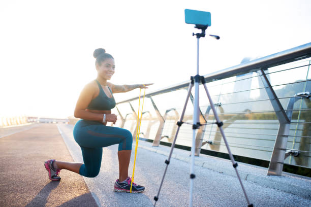 istock Woman showing nice exercises with resistance band 1179352574