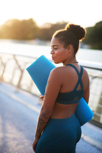 istock Woman wearing leggings and short top ready for workout 1179352642