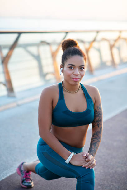 istock Dark-eyed woman feeling good while working out outside 1179352789