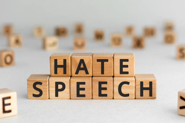 Hate speech - words from wooden blocks with letters stock photo