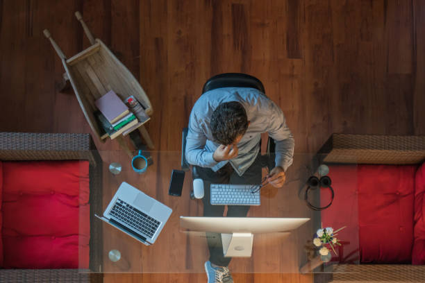 istock Tired man stress form hard work while sitting on his desk 1179356341