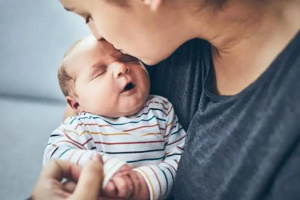 Photo of Mother with newborn son