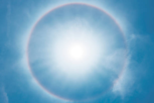 istock Sun halo phenomenon, circular rainbow around the sun 1179357659